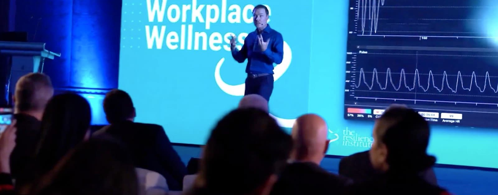Brad delivering a keynote with a live heart-rate demonstration