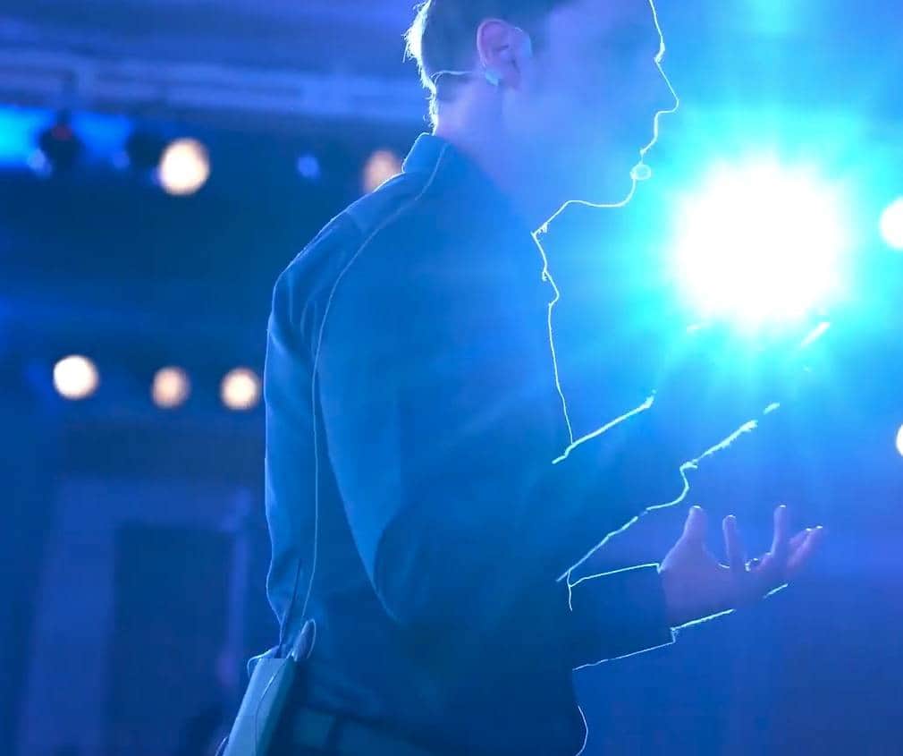 Brad Hook speaking on stage